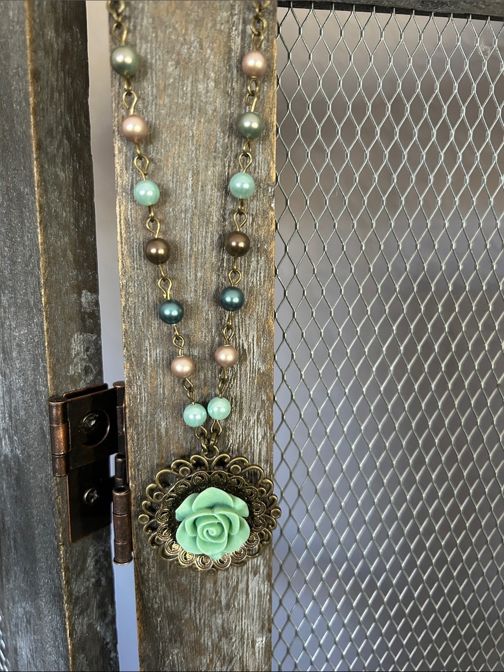 Mint rose pendant necklace.